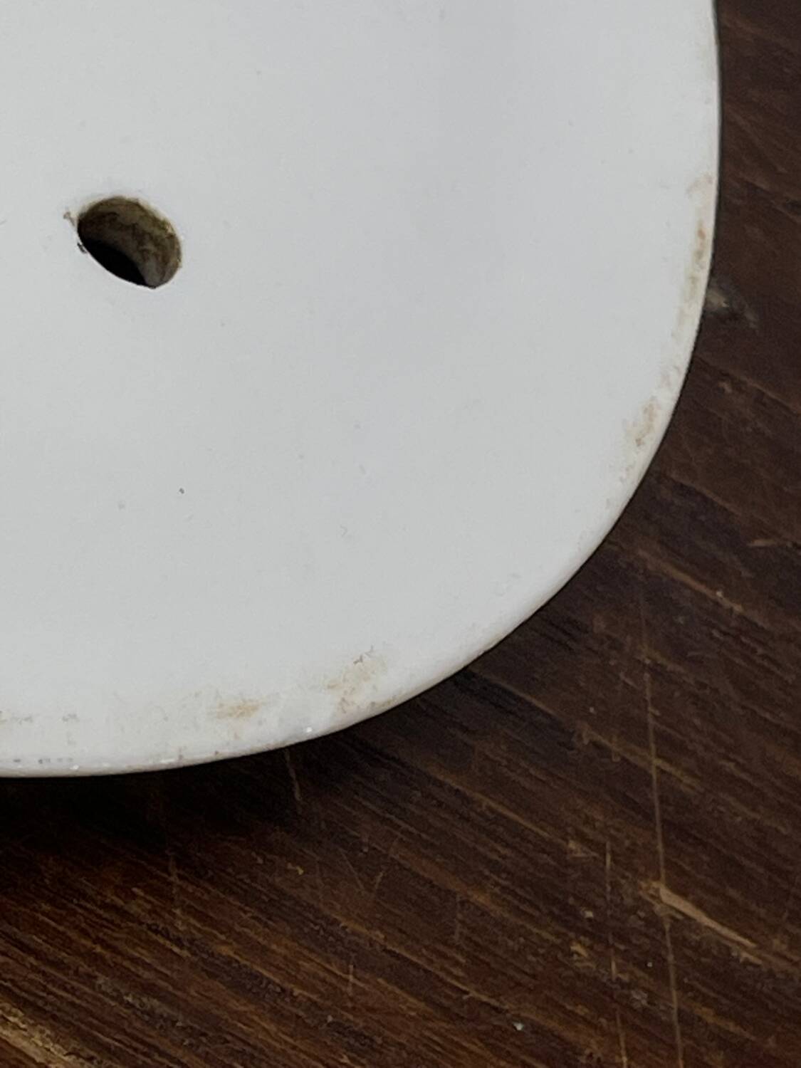 Old iron clay draining plate