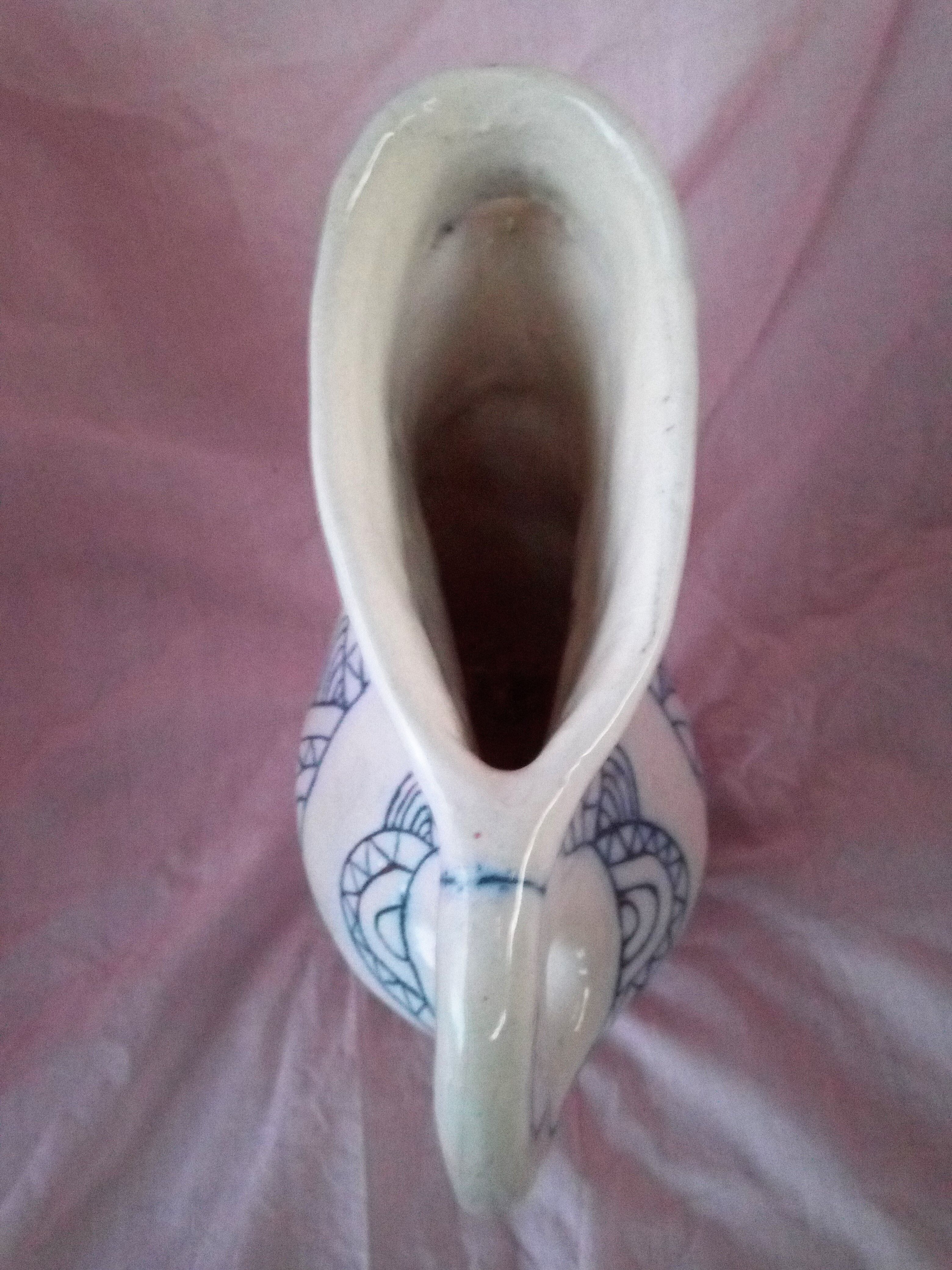 Zoomorphic pitcher in enamelled terracotta