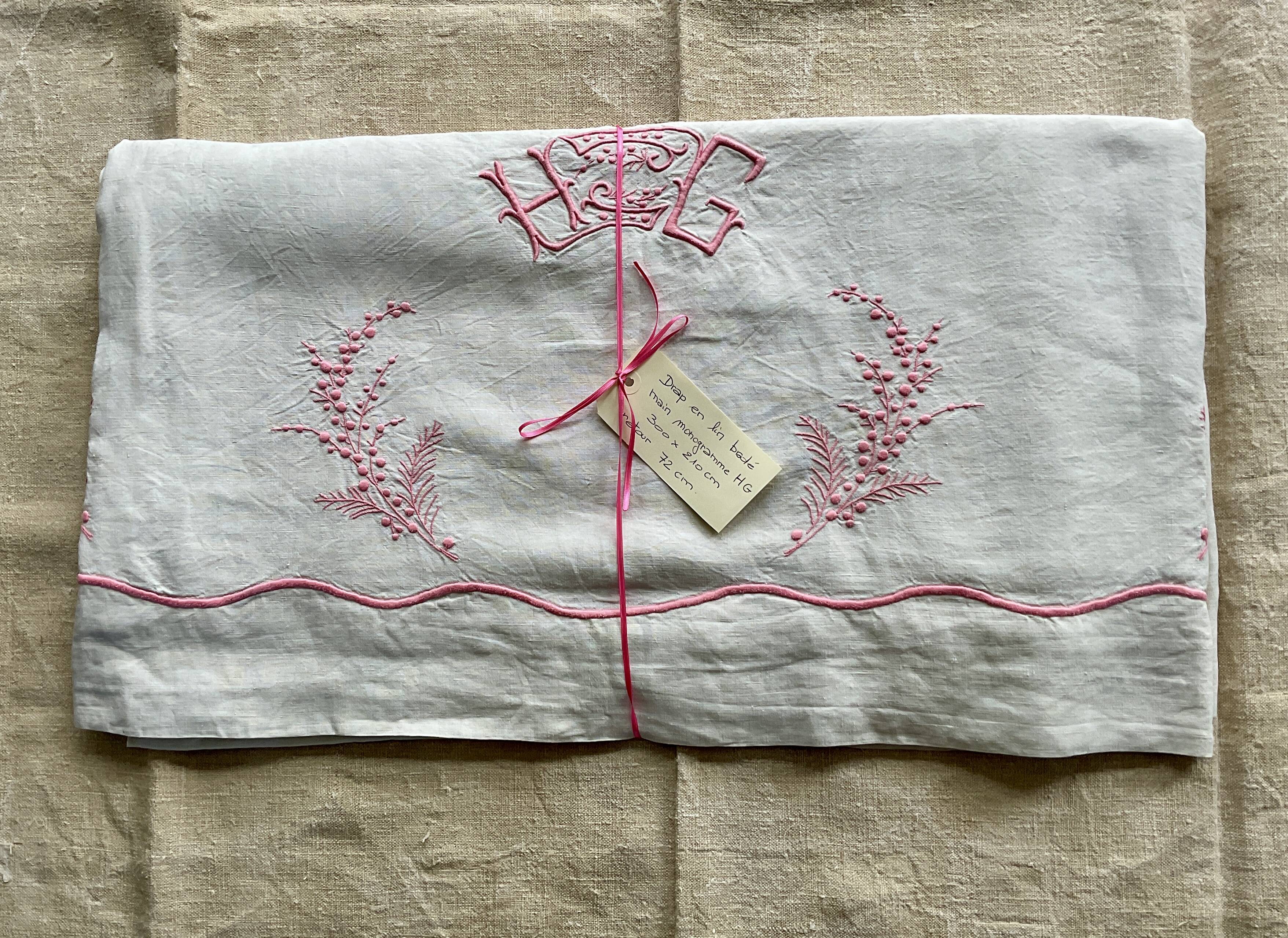 Antique linen sheet with hand-embroidered HG monogram