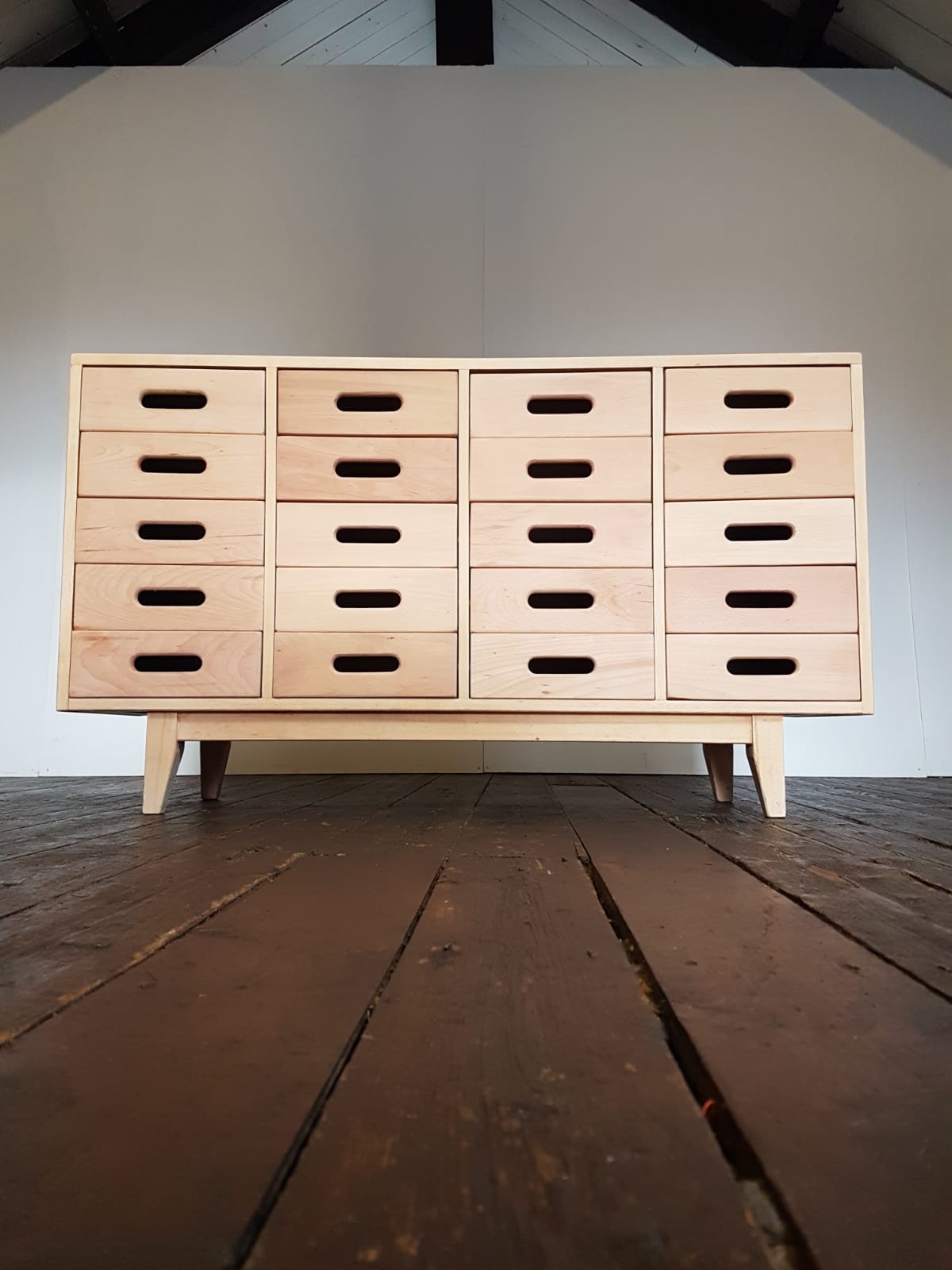 Merchandising chest of drawers by James Leonard Esavian