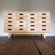 Merchandising chest of drawers by James Leonard Esavian