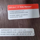 Set of 4 brown oak plywood bar stools by Fritz Hansen Series 7 by Arne Jacobsen.