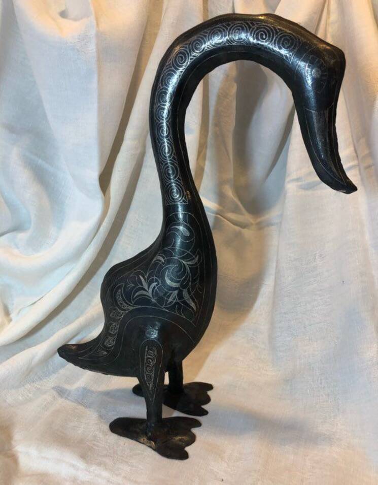Damascened metal bird sculpture