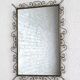 Rectangular mirror from the 50s-60s on a brass frame.