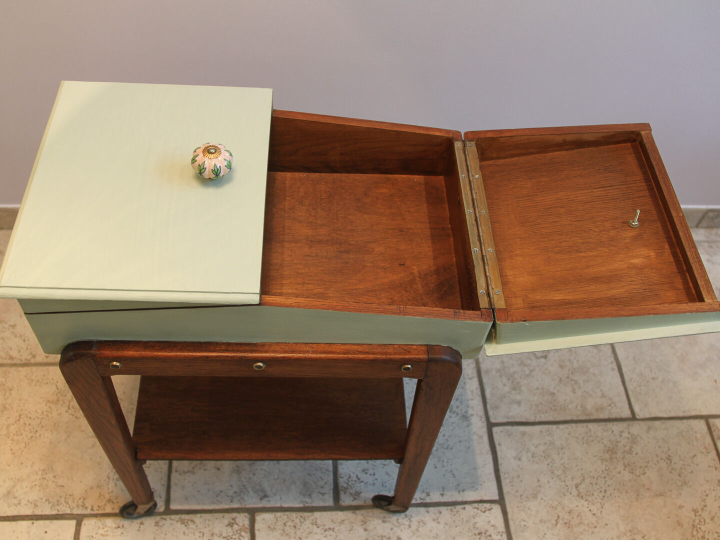 Worker green wood feet wheels