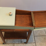 Worker green wood feet wheels