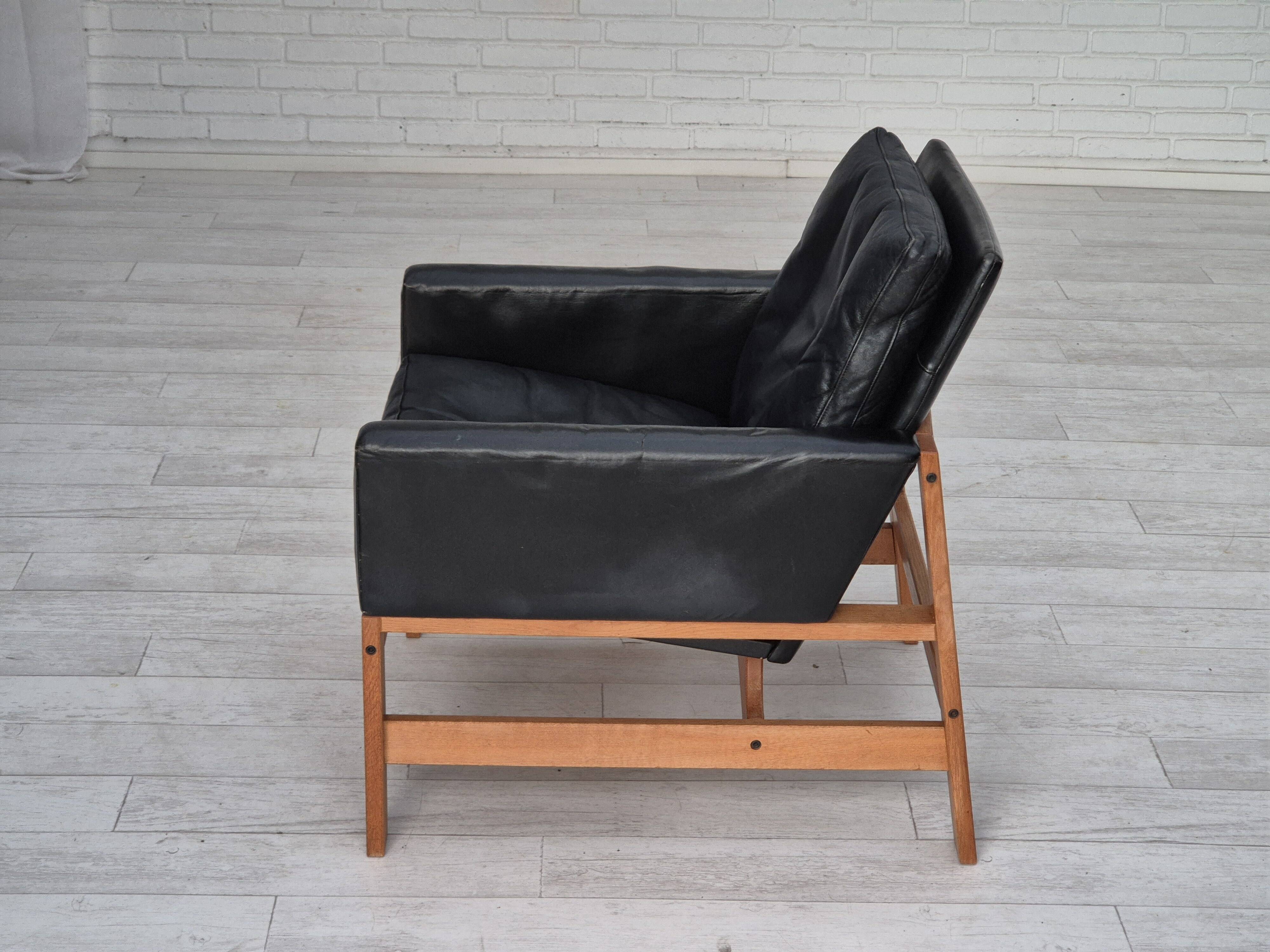 1960s, Danish lounge chair, original condition, furniture leather, solid oak wood.