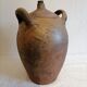 Old jar, glazed sandstone jug. Early twentieth century.