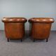 Set of 2 club chairs in black piping sheep leather