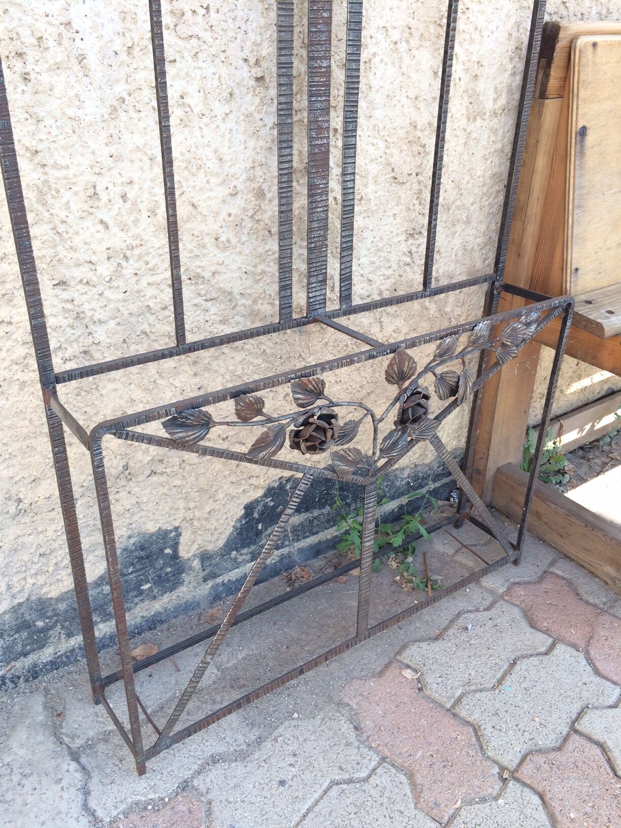 Old Art Deco coat rack in hammered iron