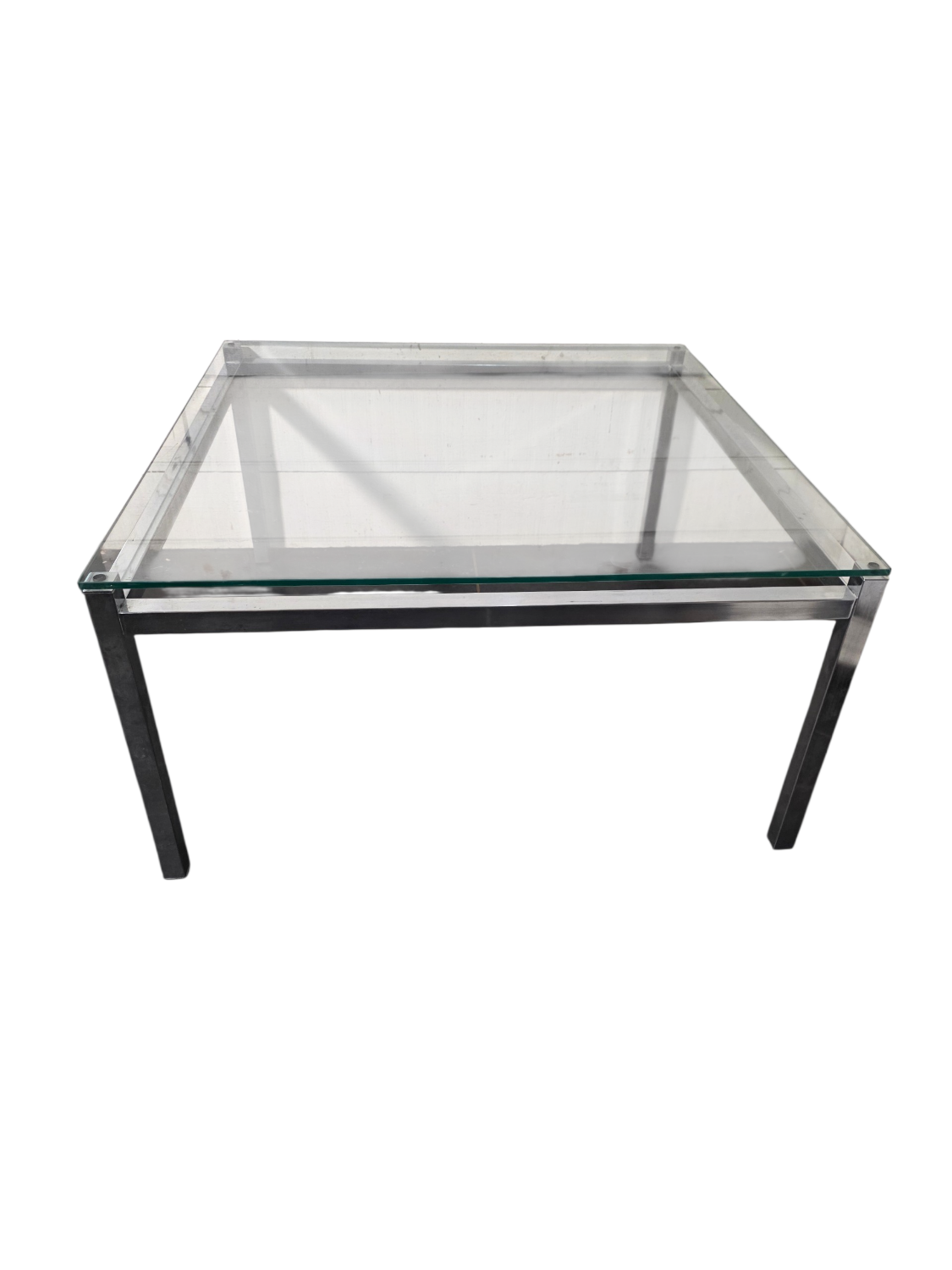 Chrome metal coffee table with a glass top from the 1970s.