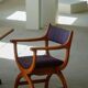 Henning Kjærnulf, pair of oak armchairs, model "Kurul", Danish modern style, 1960s.