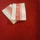 2 old red and white damask napkins