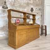 Wooden hardware cabinet painted with wood effect, circa 1940.