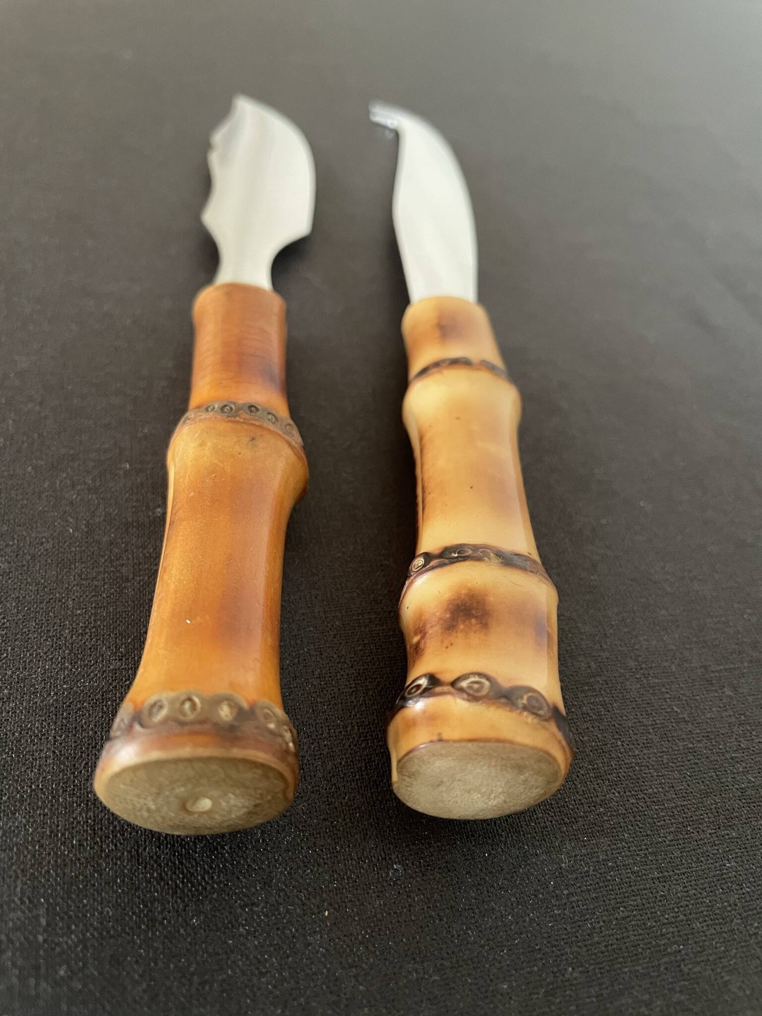 Bamboo handle cheese knives.