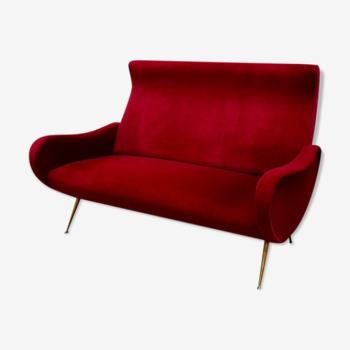 Italian red velvet armchair with brass legs