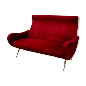 Italian red velvet armchair with brass legs