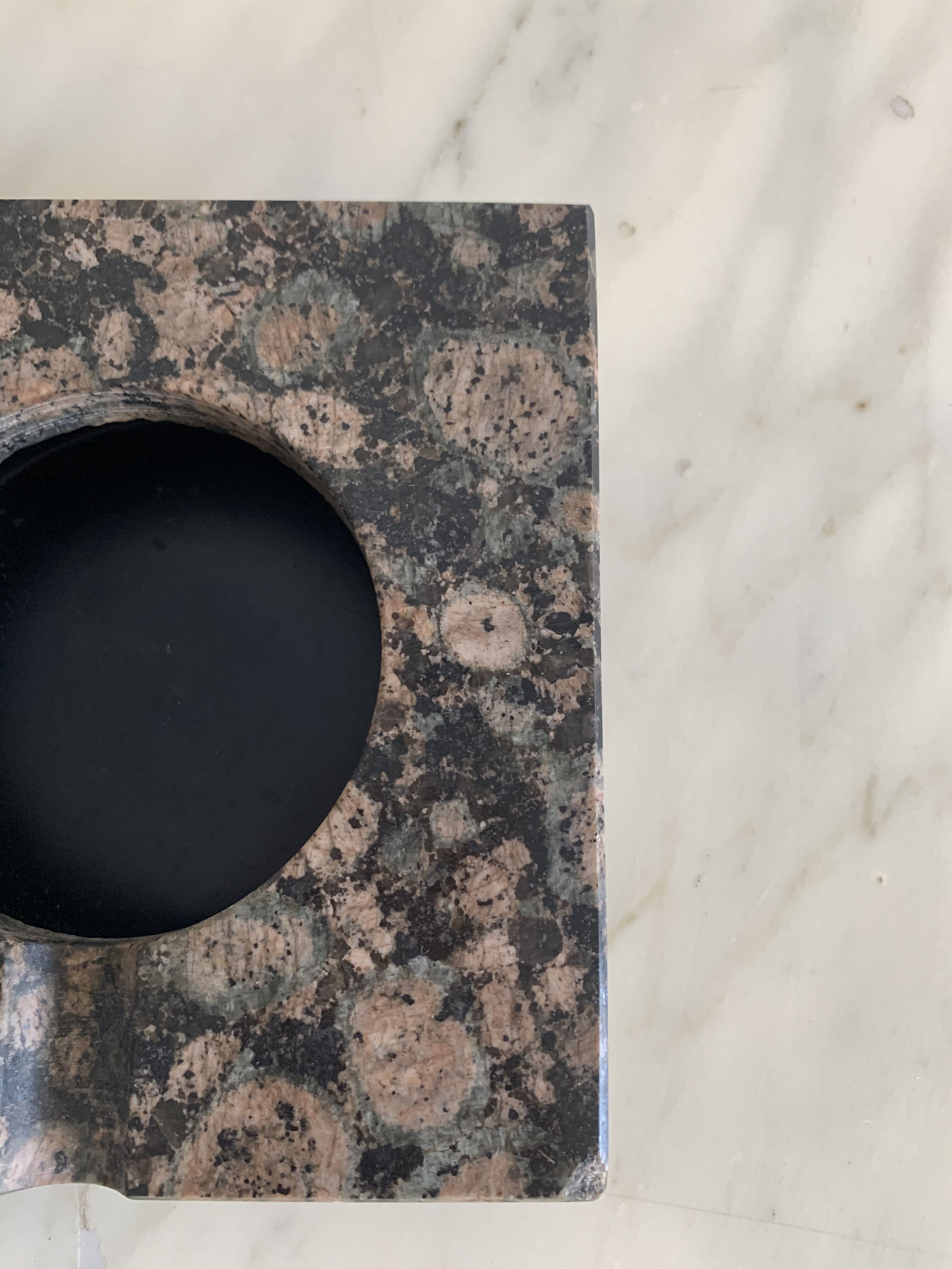 Grey and black speckled marble ashtray