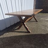 Dining table half a century with crossed legs