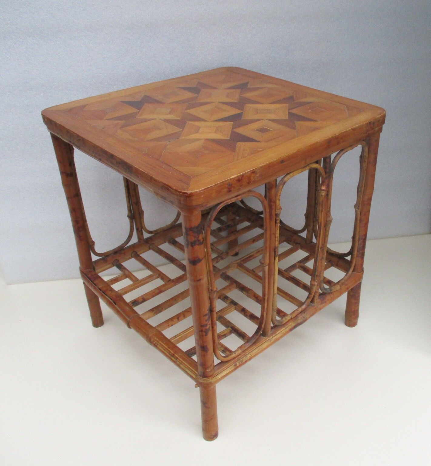 Vintage bamboo coffee table. Marquetry top
