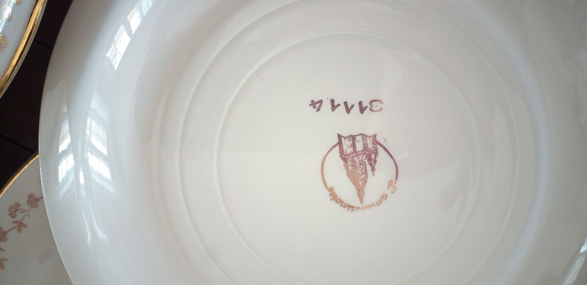 Set of 5 flat porcelain plates L'Amandinoise
