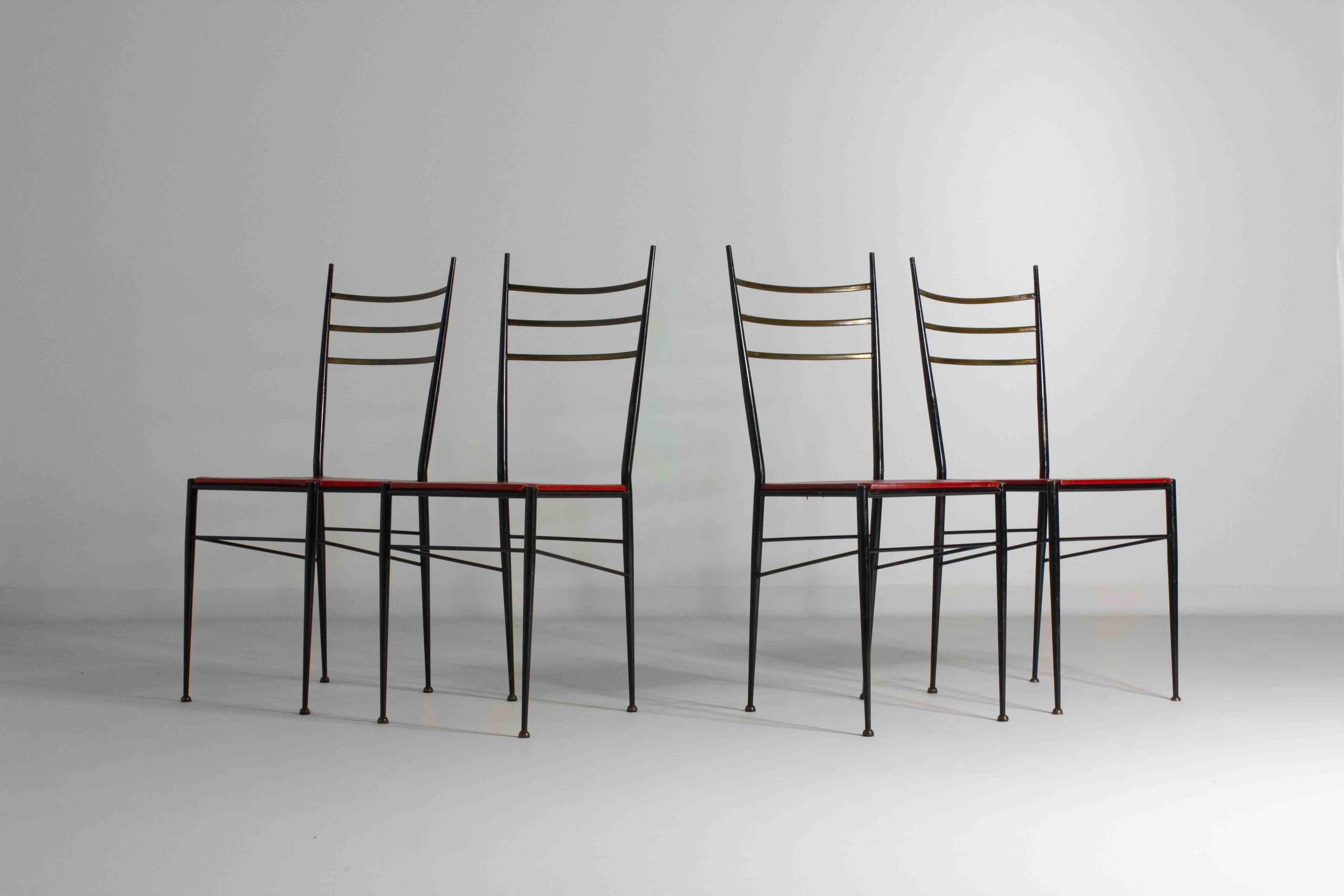 Fine set of metal dining chairs with red leather seating, Italy 1970s