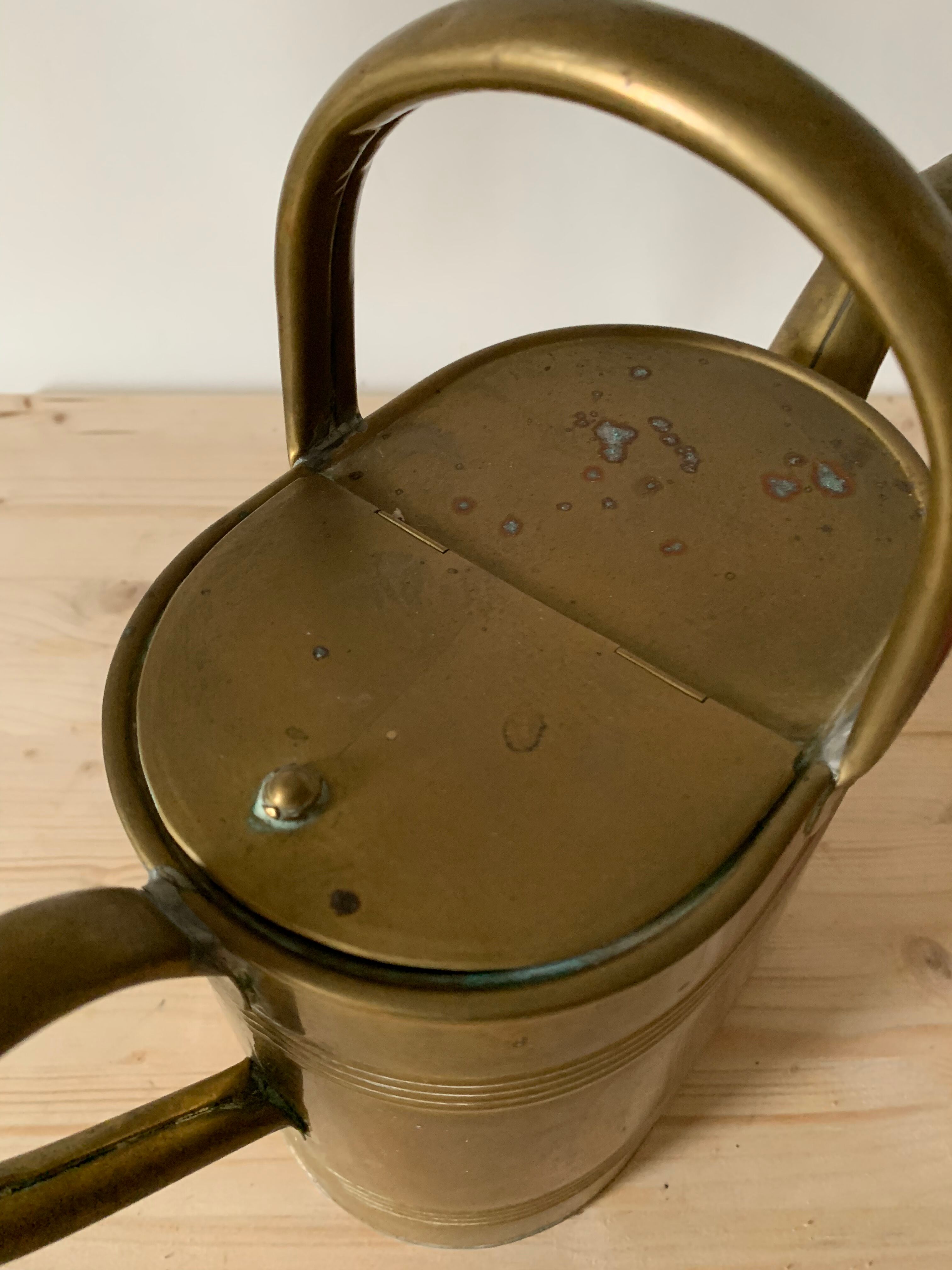 Brass watering can