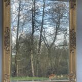 vintage beveled mirror in rectangular shape stucco and gilded wood in Louis XV baroque style