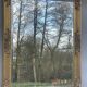 vintage bevelled mirror in rectangular shape, stucco and gilded wood in Louis XV baroque style