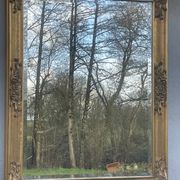 vintage bevelled mirror in rectangular shape, stucco and gilded wood in Louis XV baroque style