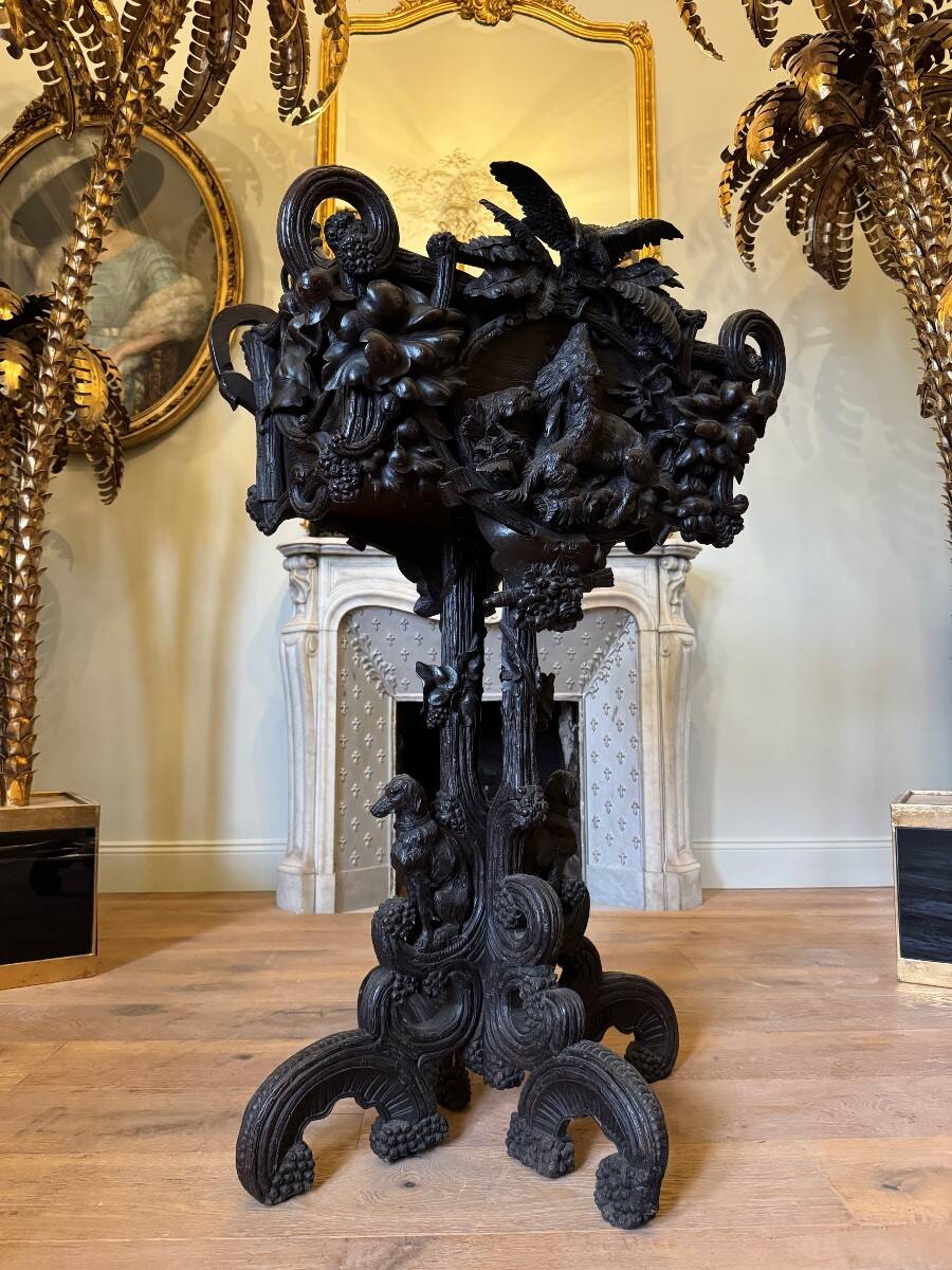 Carved wooden jardinière, Black Forest work, 19th century.