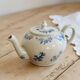 Antique teapot Saint-Uze steel clay with cobalt blue floral decoration.
