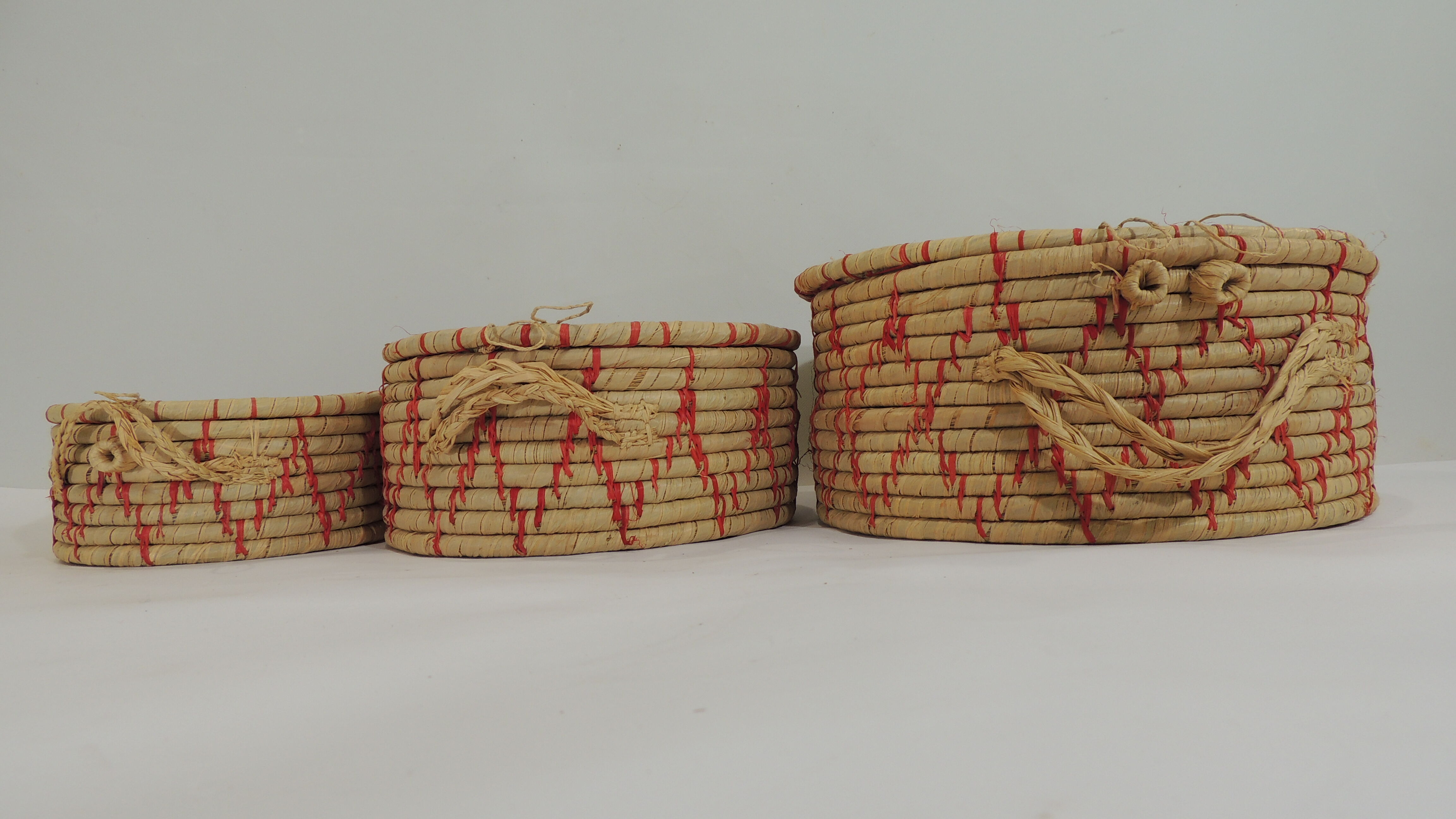 Set of three african raffia basket