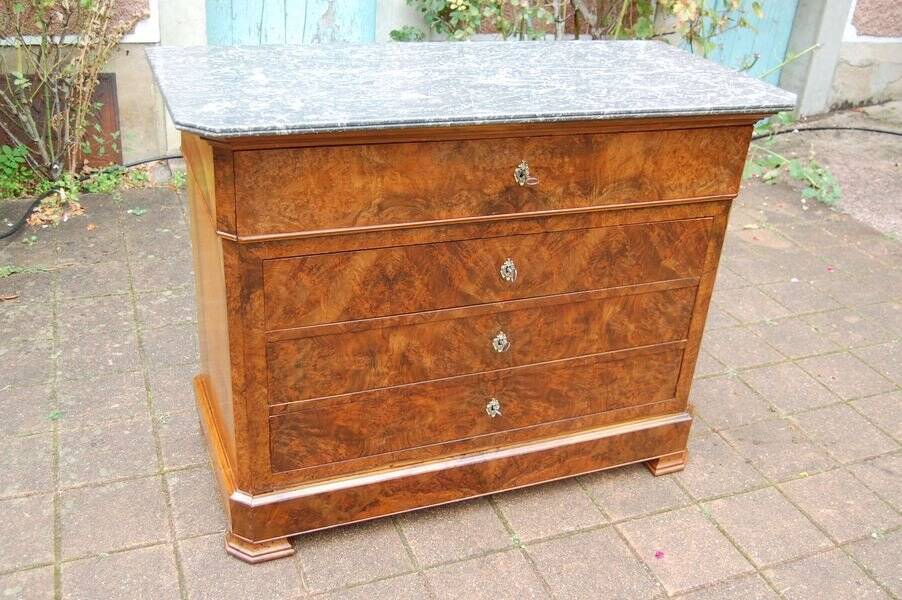 Louis Philippe period walnut secretary chest of drawers from the 19th century.