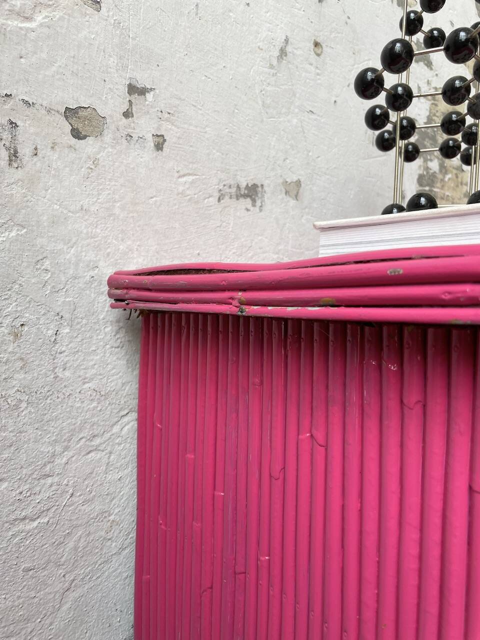 Vintage pink rattan chest of drawers