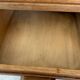 Vintage wooden secretary desk in the style of a professional piece of furniture