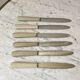 set of 6 white bakelite knives from the 60s