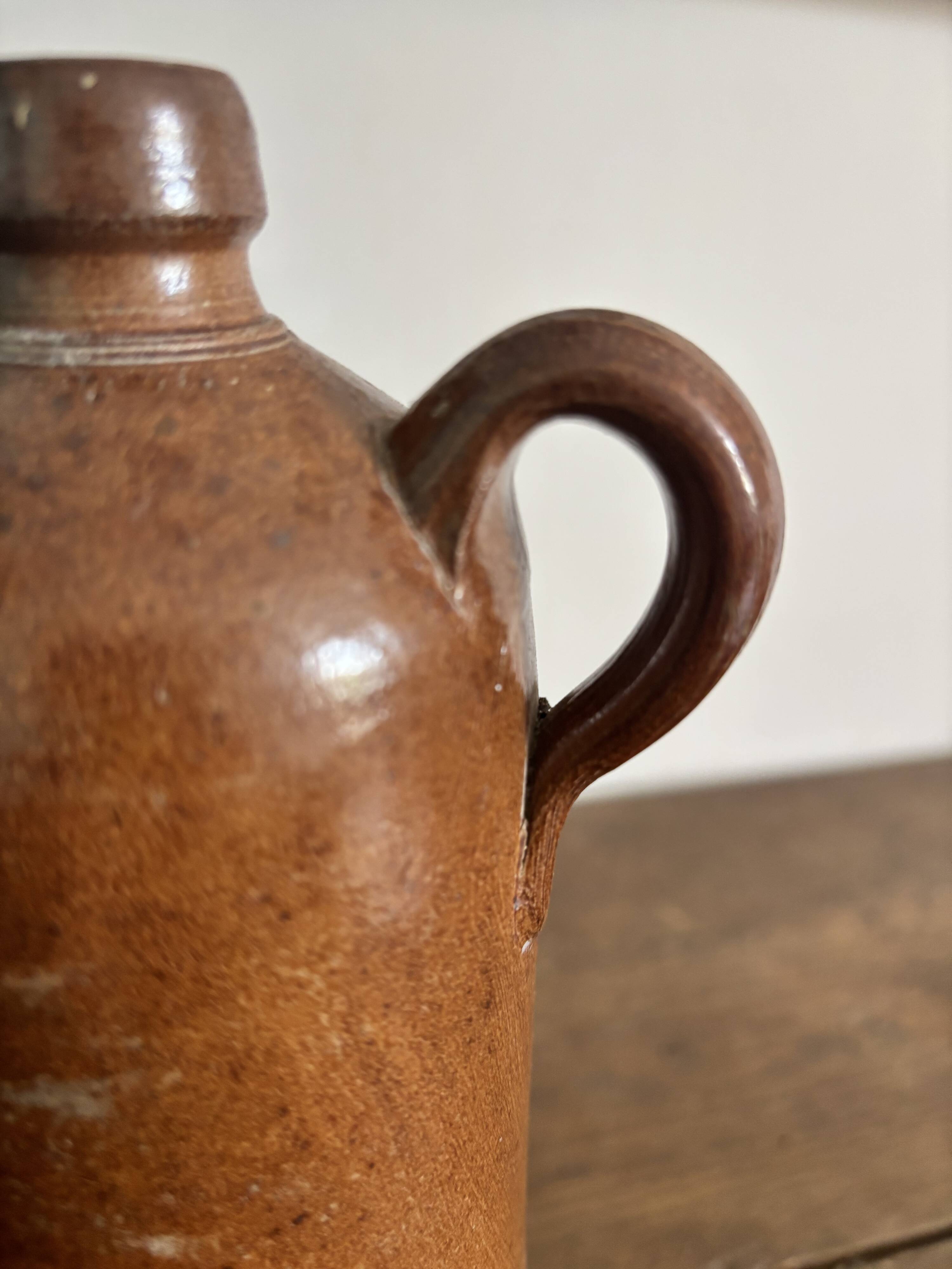 Vintage brown stoneware bottle – Large handled jug
