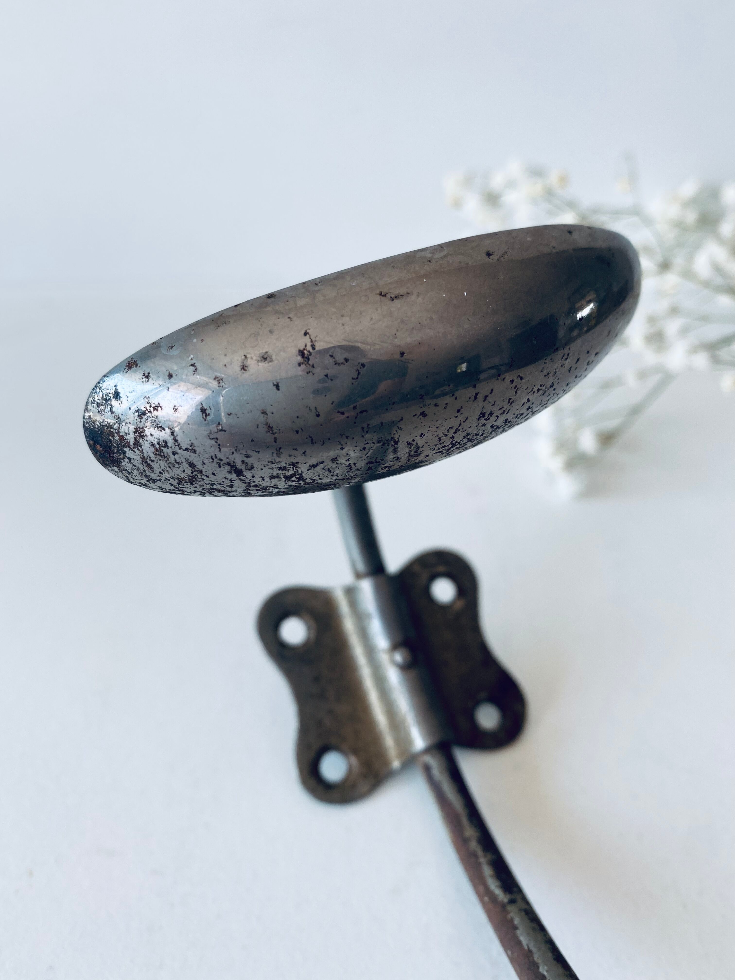 Ancient metal patère