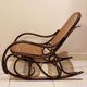 Vintage rocking chair for children in dark rattan and canework, rocking chair