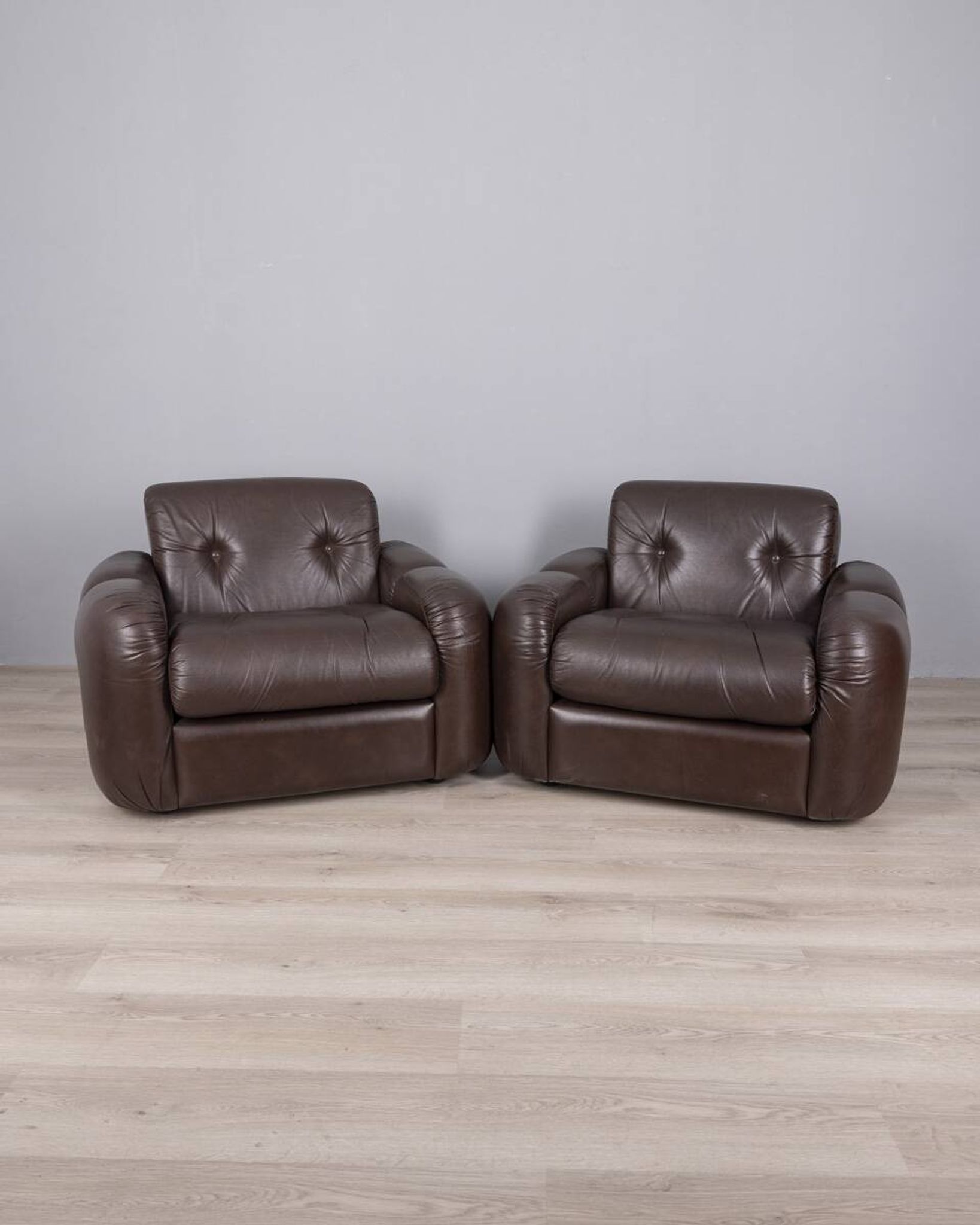 Pair of vintage 1970s brown leather armchairs designed by Ceriotti