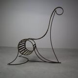 Set of three sculptural iron chairs