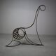 Set of three sculptural iron chairs