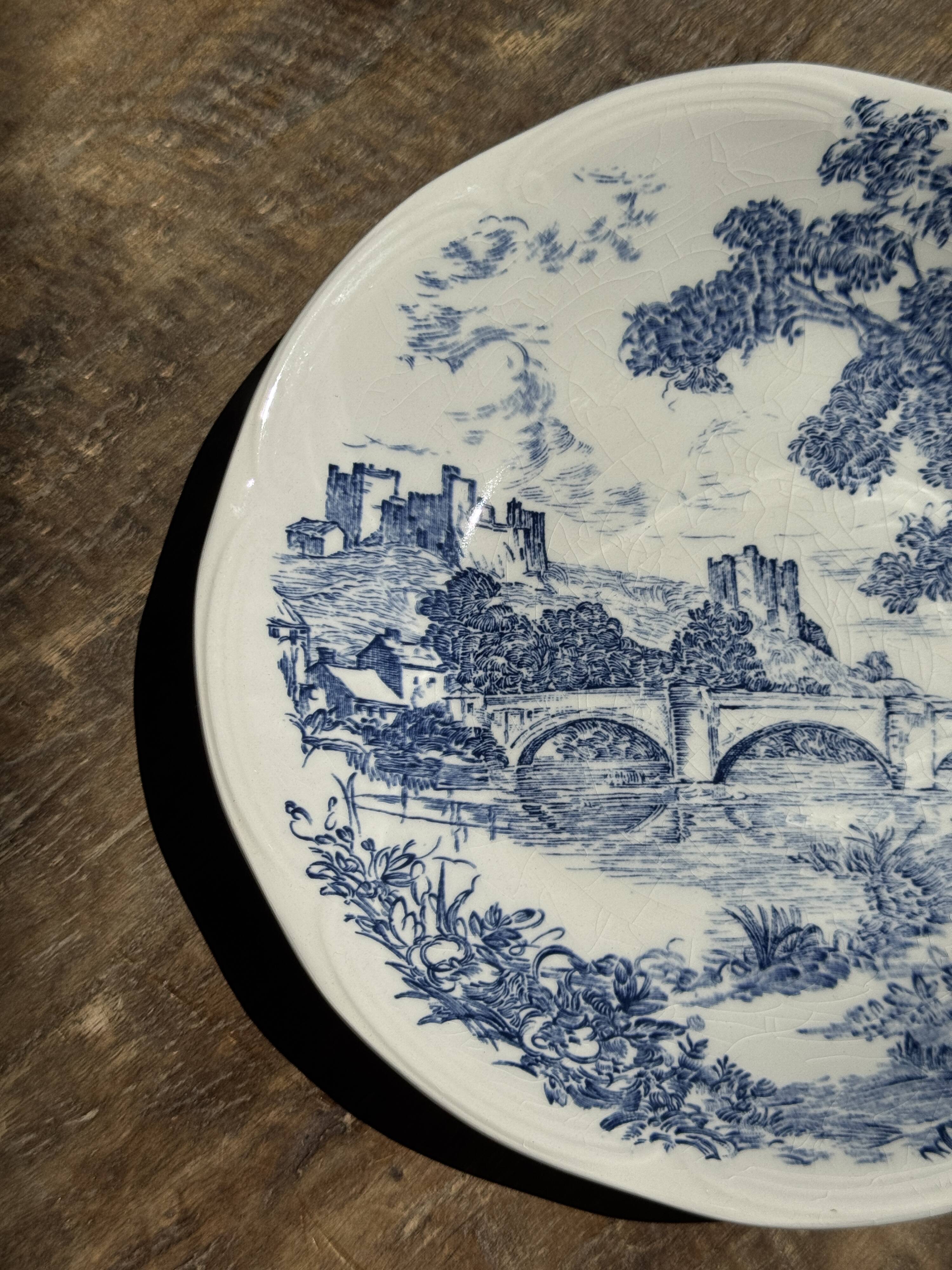 Small deep Gien earthenware plate with blue landscape motif D21.5