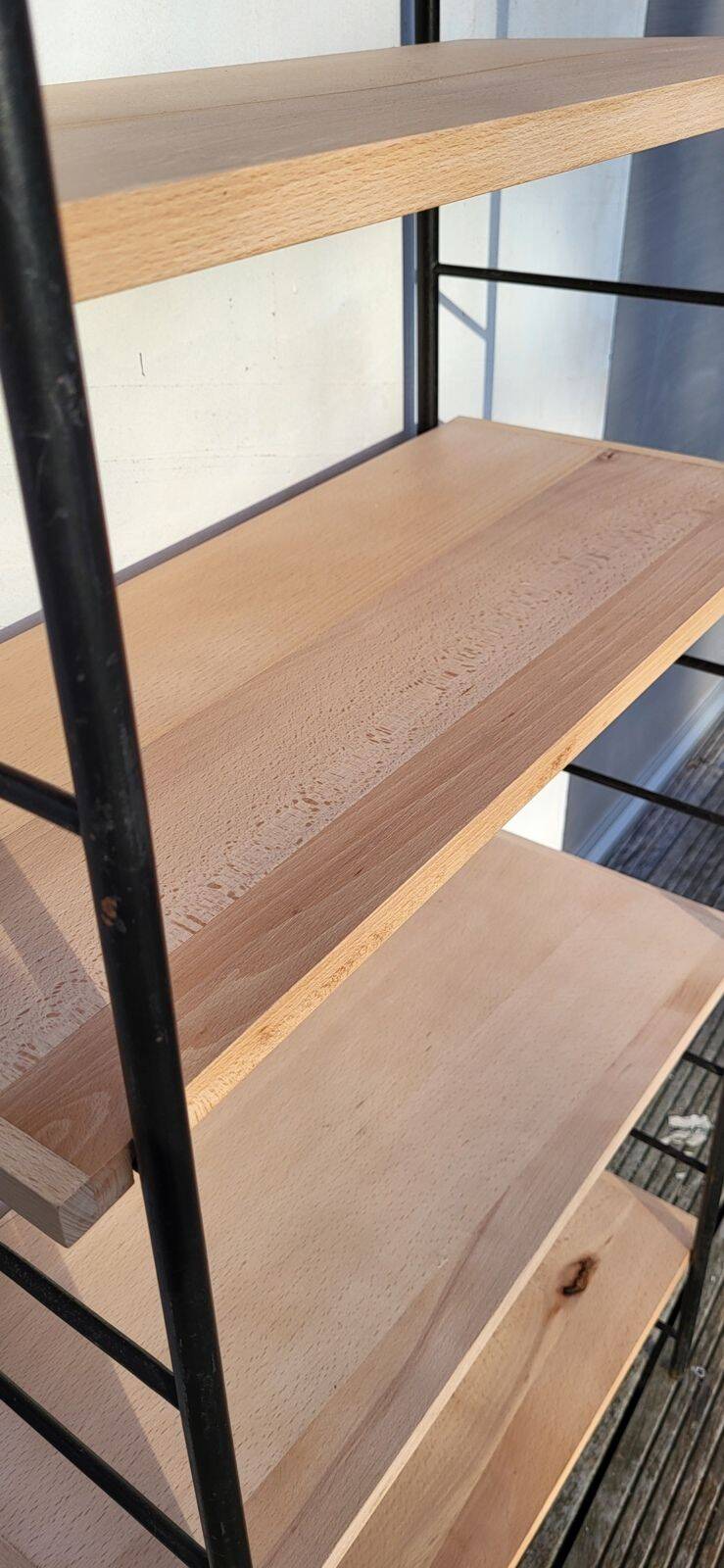 Large String shelf with wooden ladders and metal.