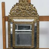 Old bevel mirror with metal parcloses pushed back Louis XIV style