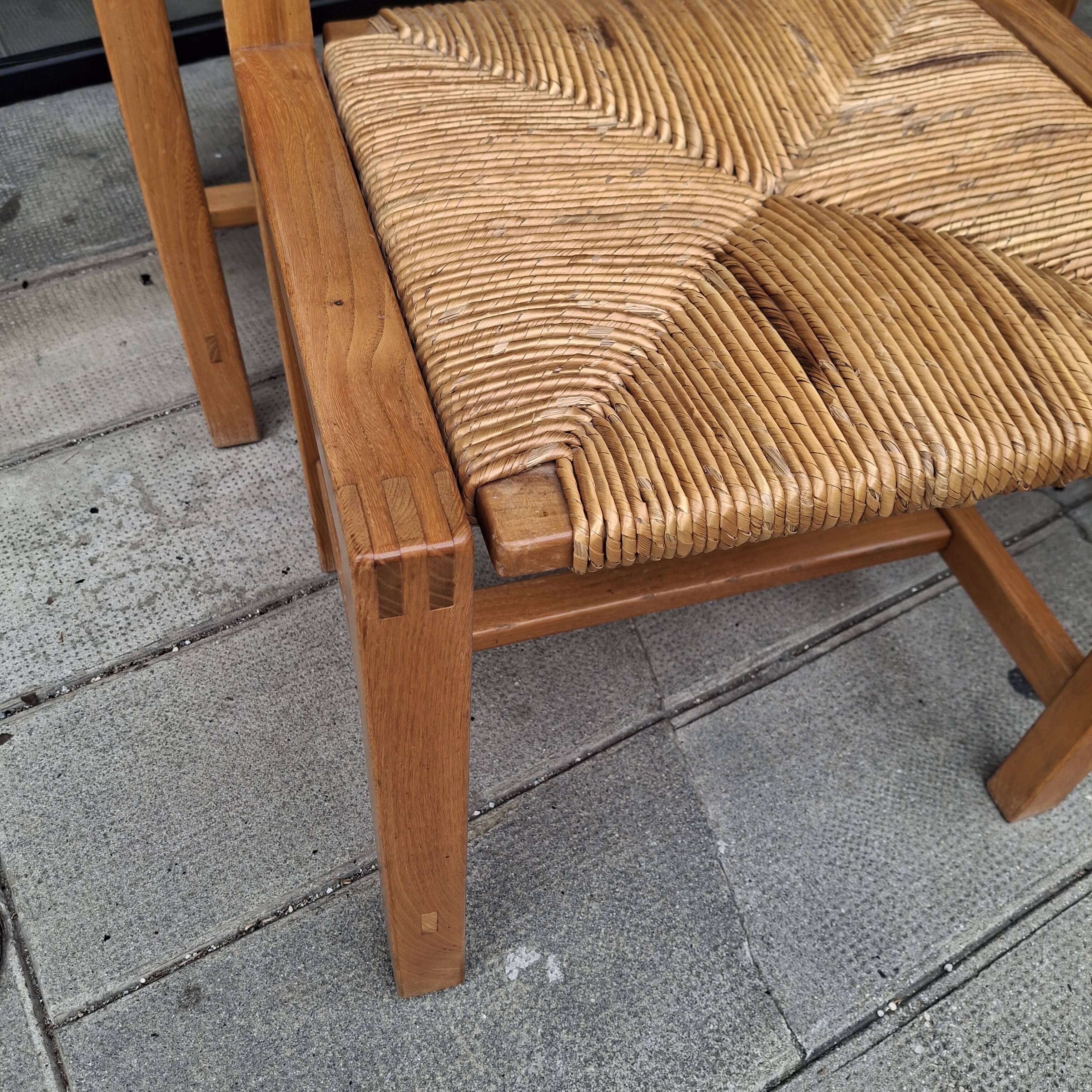Set of four regaining chairs in elm. 1970