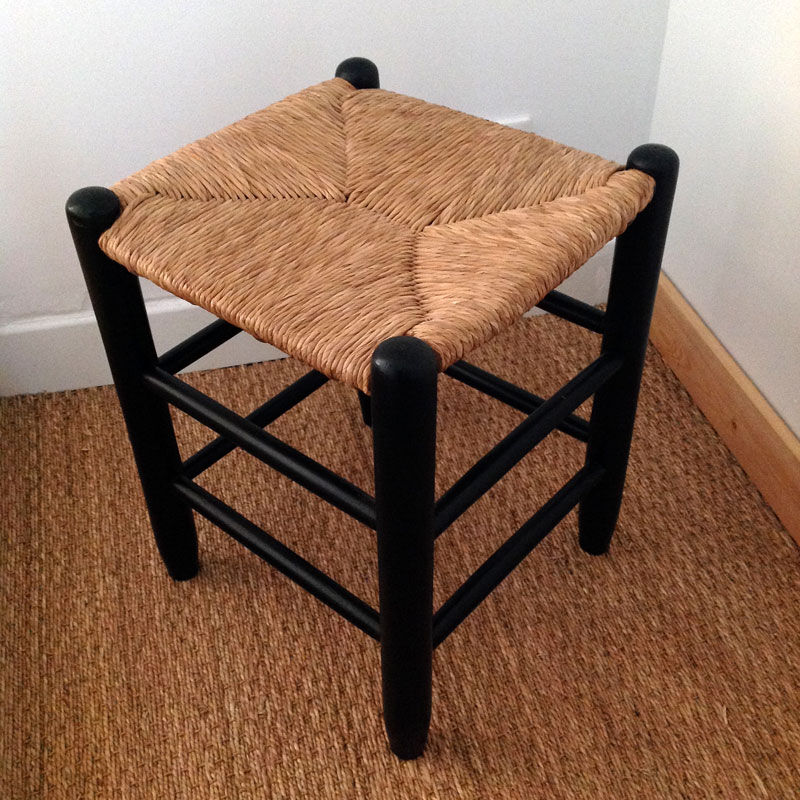 Straw and black stool