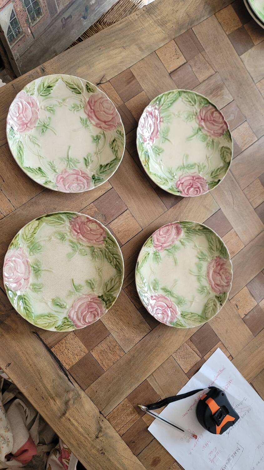 4 pink earthenware plates