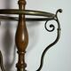 Umbrella stand and English-style wooden and brass canes, 20th century.